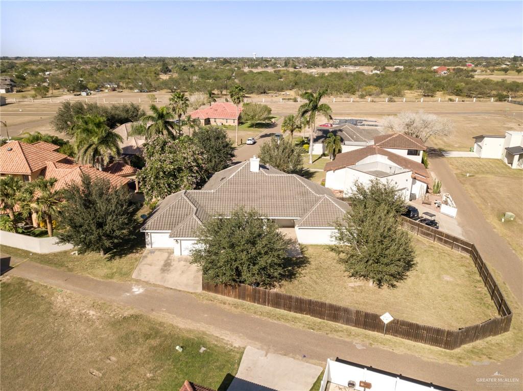 3814 B Shea Weslaco, TX 78596 - Photo 40 of 43 an aerial view of residential houses with outdoor space