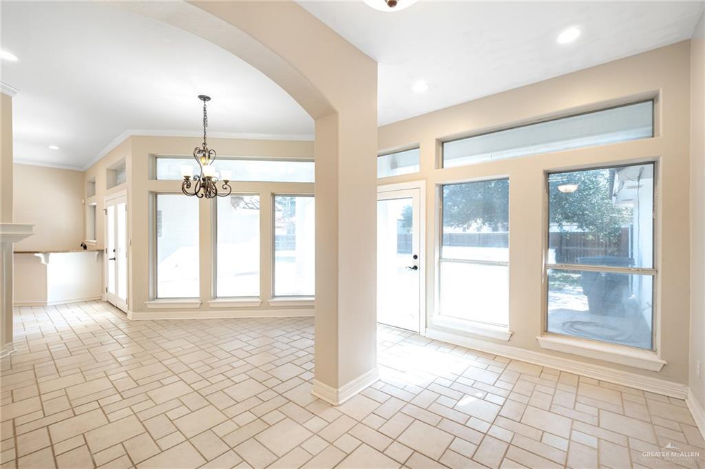 3814 B Shea Weslaco, TX 78596 - Photo 7 of 43 a view of an empty room with window and chandelier