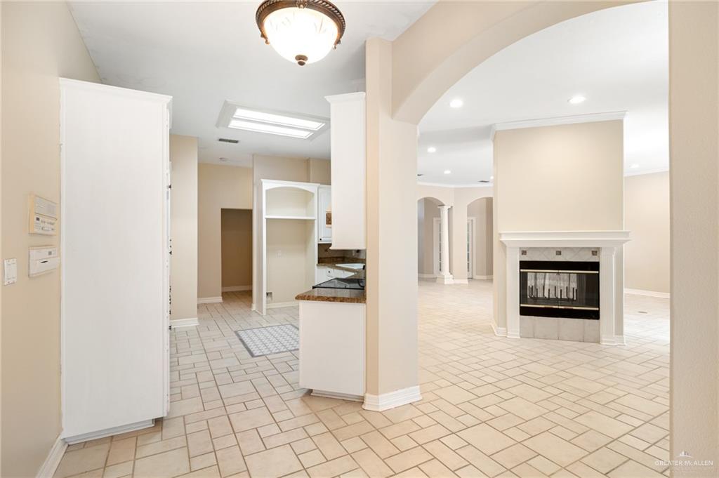 3814 B Shea Weslaco, TX 78596 - Photo 8 of 43 a view of a kitchen with furniture and an empty room