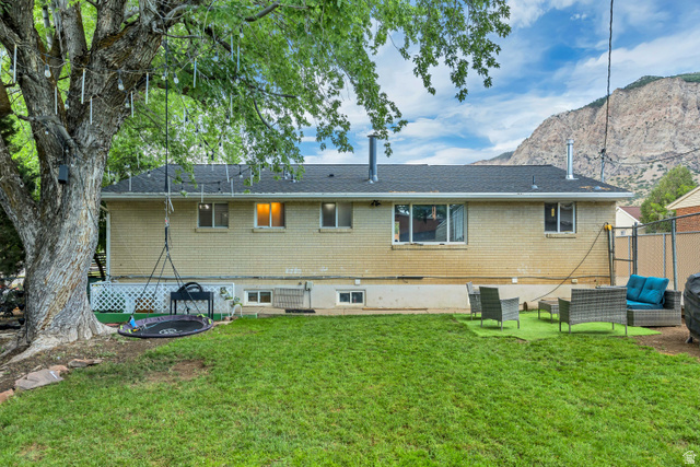 1215 8th Street Ogden, UT 84404 - Photo 39 of 39 Expansive green lawn with mountain backdrop