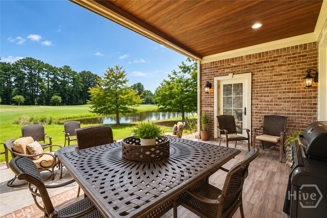 336 Spanton Crescent Pooler, GA 31322 - Photo 39 of 48 First floor covered patio looking at golf course