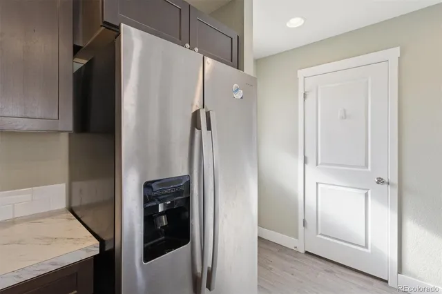 a bathroom with a shower and a sink