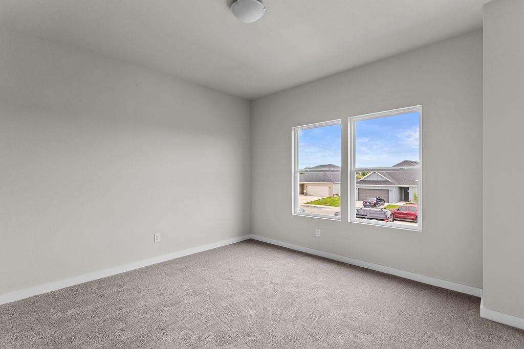 620 Alameda Road Azle, TX 76020 - Photo 13 of 27 a view of an empty room with a window