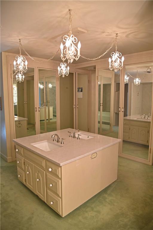 320 McCullough Road Sharpsville, PA 16150 - Photo 18 of 25 master bath walls are lined with closets features quartz double sink, makeup table, shower and spa tub