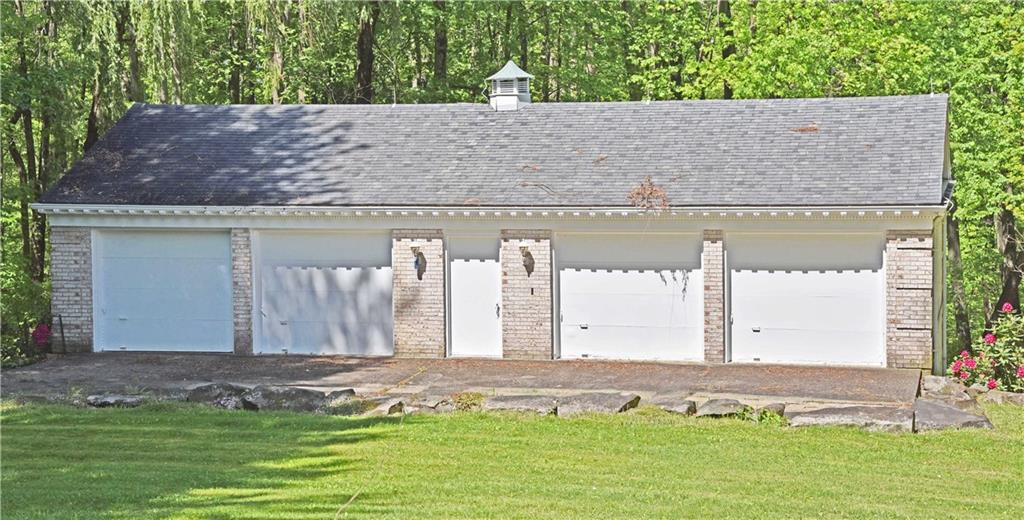 320 McCullough Road Sharpsville, PA 16150 - Photo 22 of 25 carriage house has two levels with 4 car garages on each