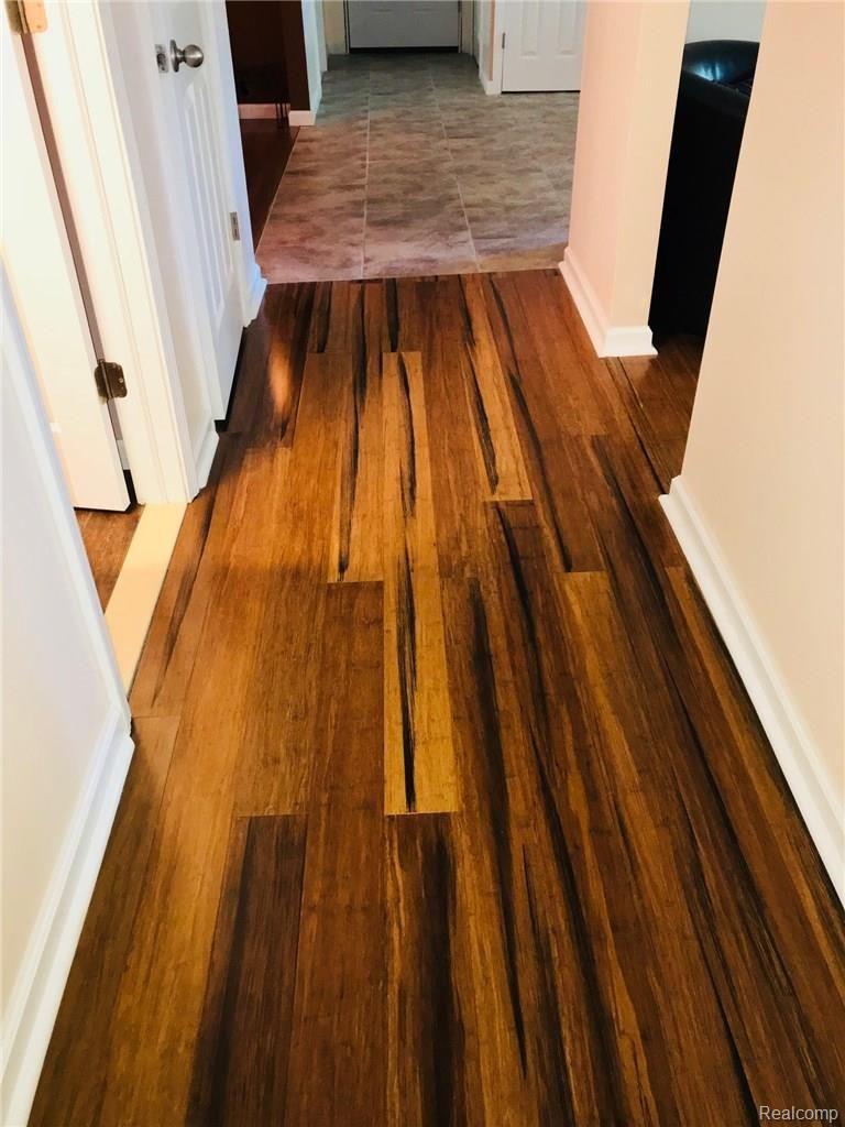18893 Haggerty Road Belleville, MI 48111 - Photo 16 of 44 Haggerty Bamboo floor in hall.jpg
