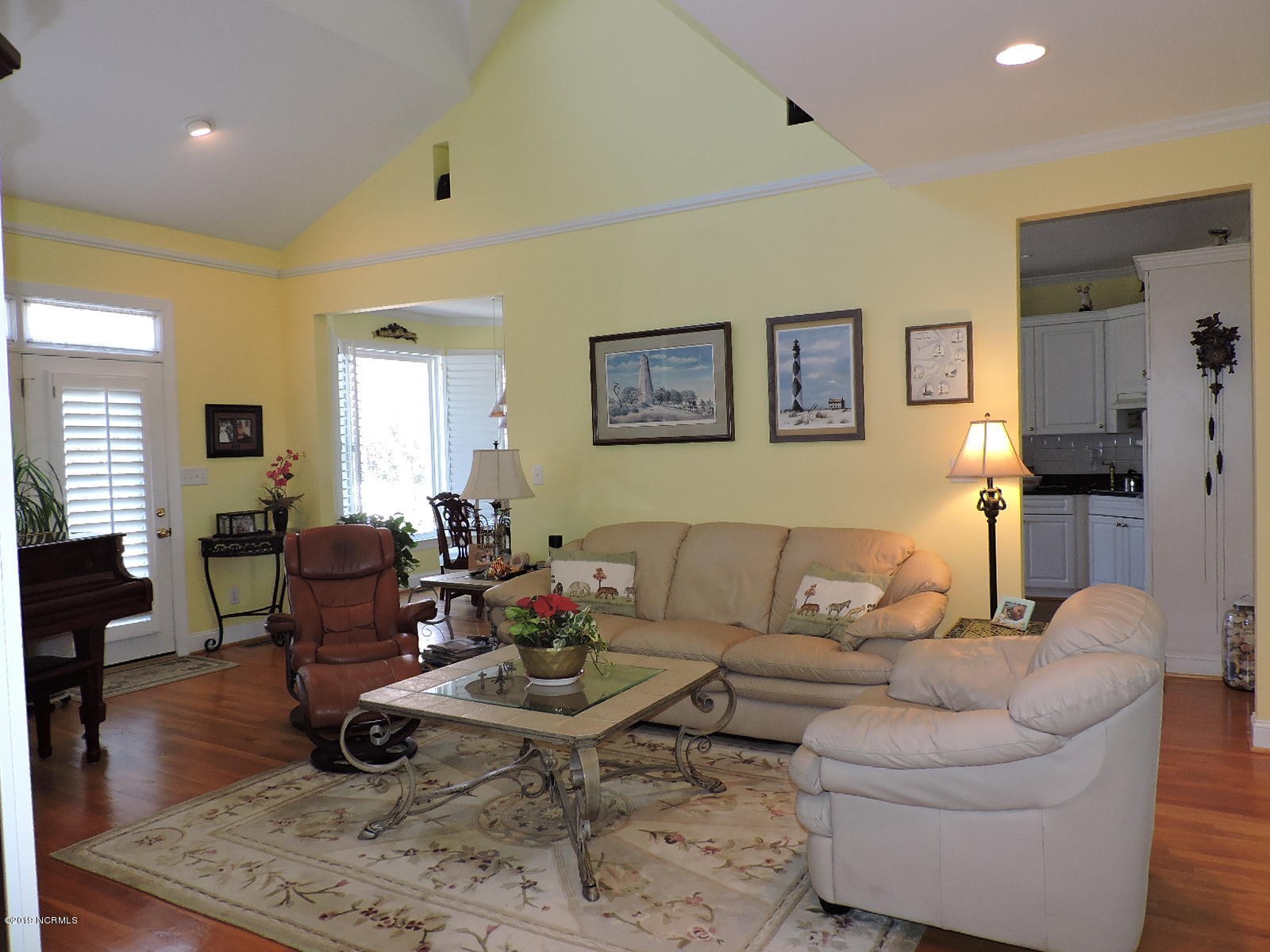 148 Magens Way Cedar Point, NC 28584 - Photo 8 of 23 8 Living room with vaulted ceiling