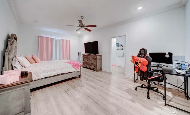 a bedroom with a bed and furniture