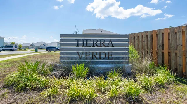 a view of a swimming pool with a garden