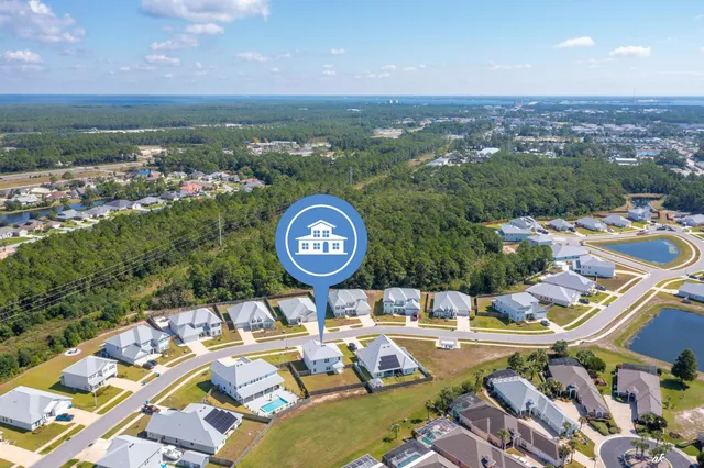a view of a swimming pool with a lounge chair