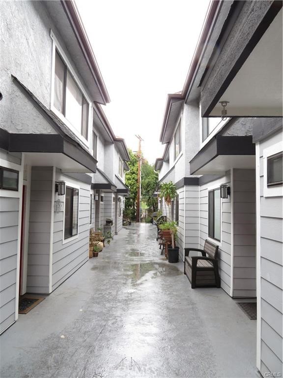 12415 Riverside Drive, Unit 1 Valley Village, CA 91607 - Photo 2 of 16 a view of a building with car parked