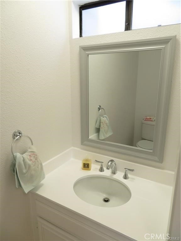 12415 Riverside Drive, Unit 1 Valley Village, CA 91607 - Photo 5 of 16 a bathroom with a sink and a mirror