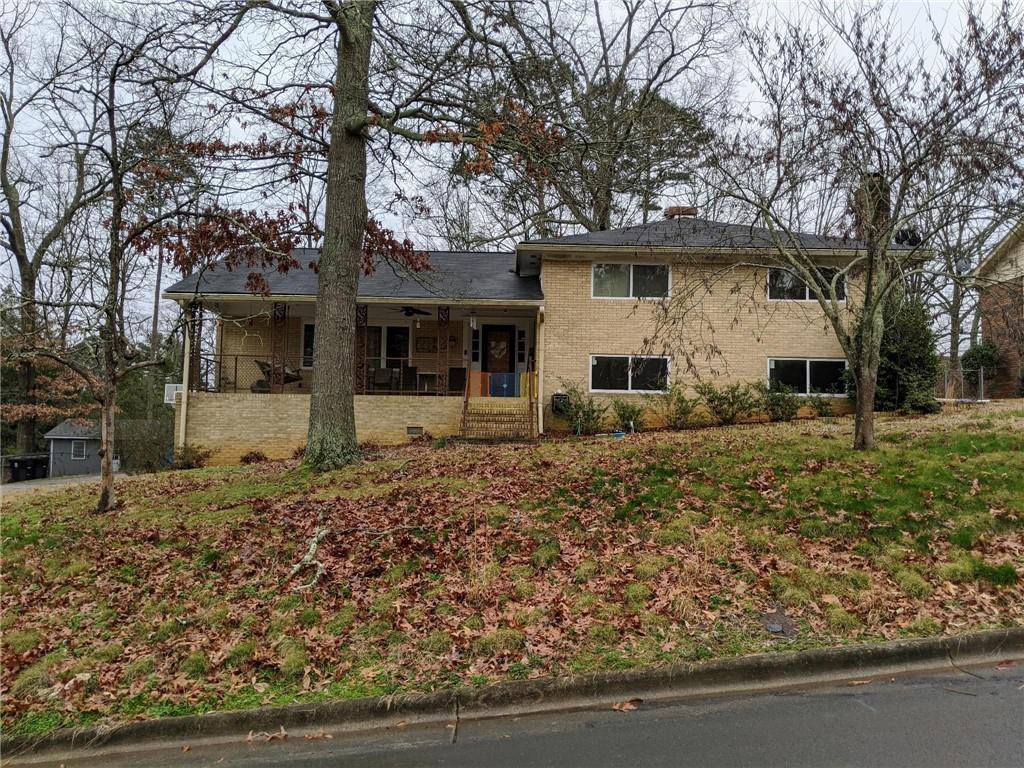 105 Hycliff Road Southwest Rome, GA 30165 - Photo 1 of 1 a front view of a house with garden