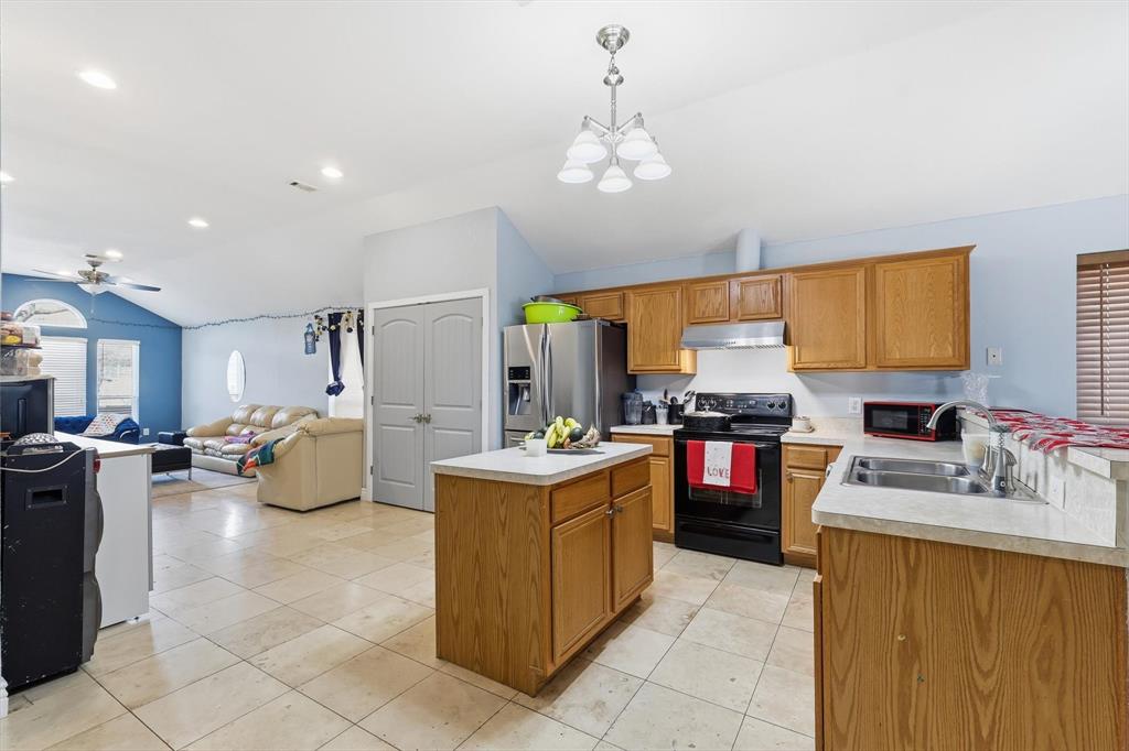 114 Drake Lane Garland, TX 75043 - Photo 11 of 27 a kitchen with stainless steel appliances lots of counter top space