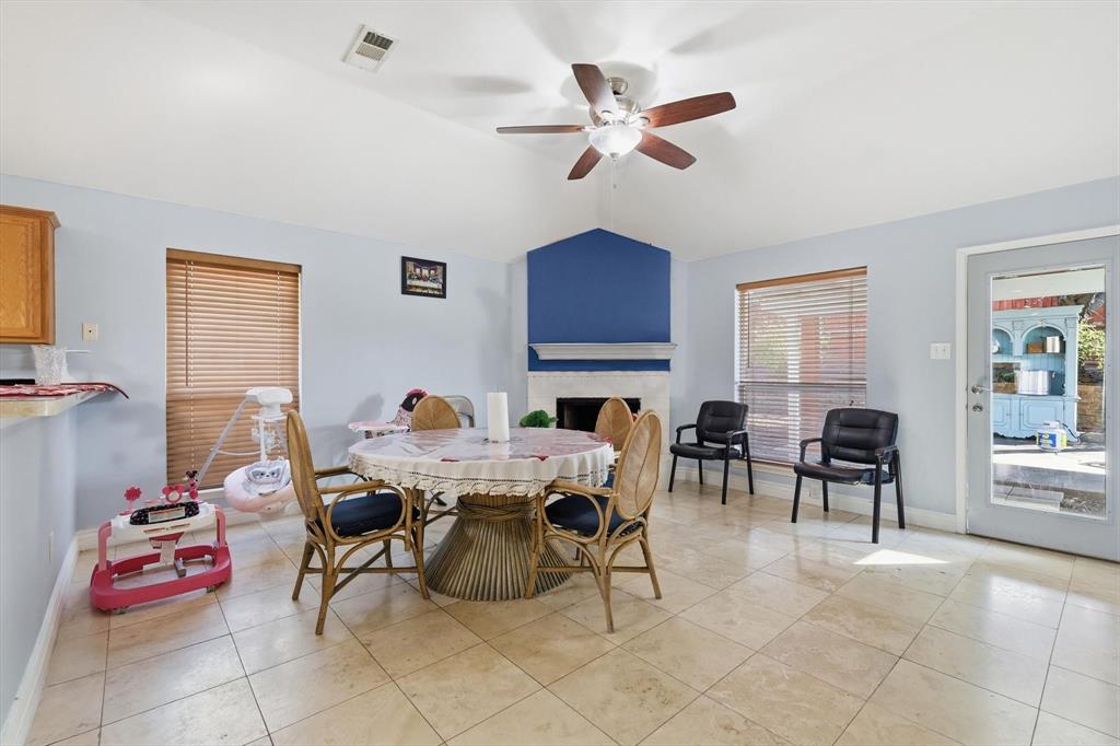114 Drake Lane Garland, TX 75043 - Photo 12 of 27 a living room with furniture and a fireplace