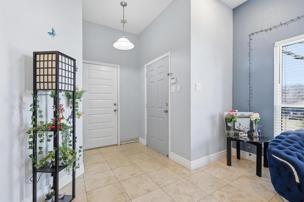 114 Drake Lane Garland, TX 75043 - Photo 5 of 27 a view of room with window and furniture