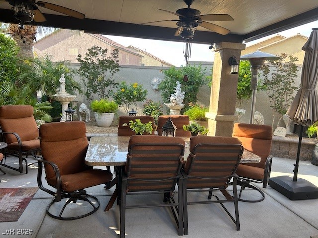 8175 Arville Street, Unit 210 Las Vegas, NV 89139 - Photo 9 of 36 View of patio / terrace with a ceiling fan and outdoor dining area