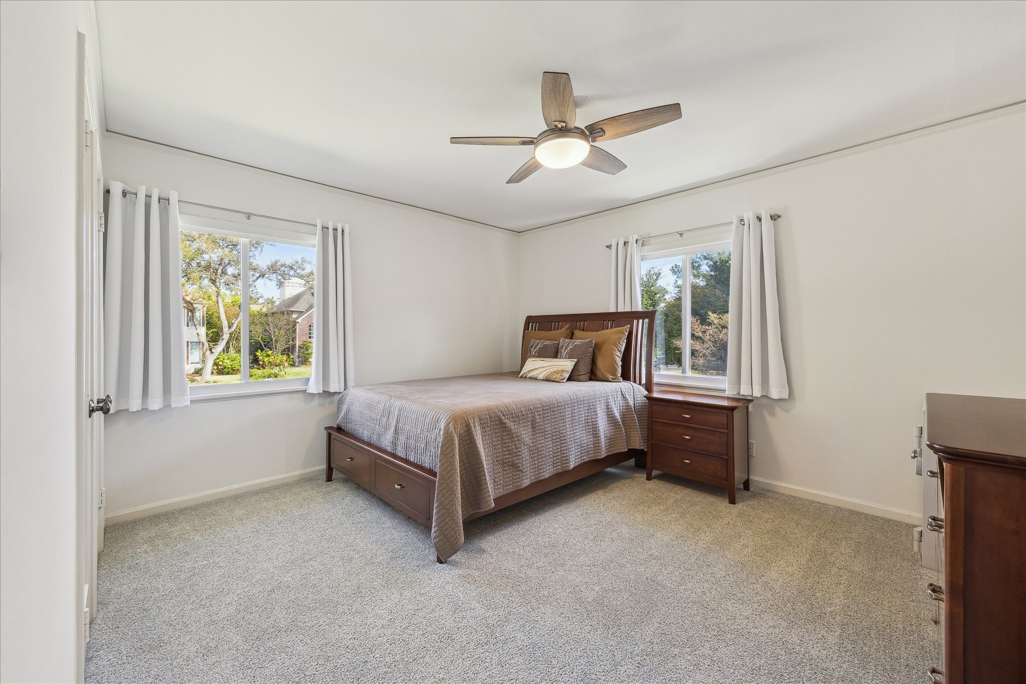 4388 Fiesta Lane Houston, TX 77004 - Photo 13 of 24 a bedroom with a bed and window