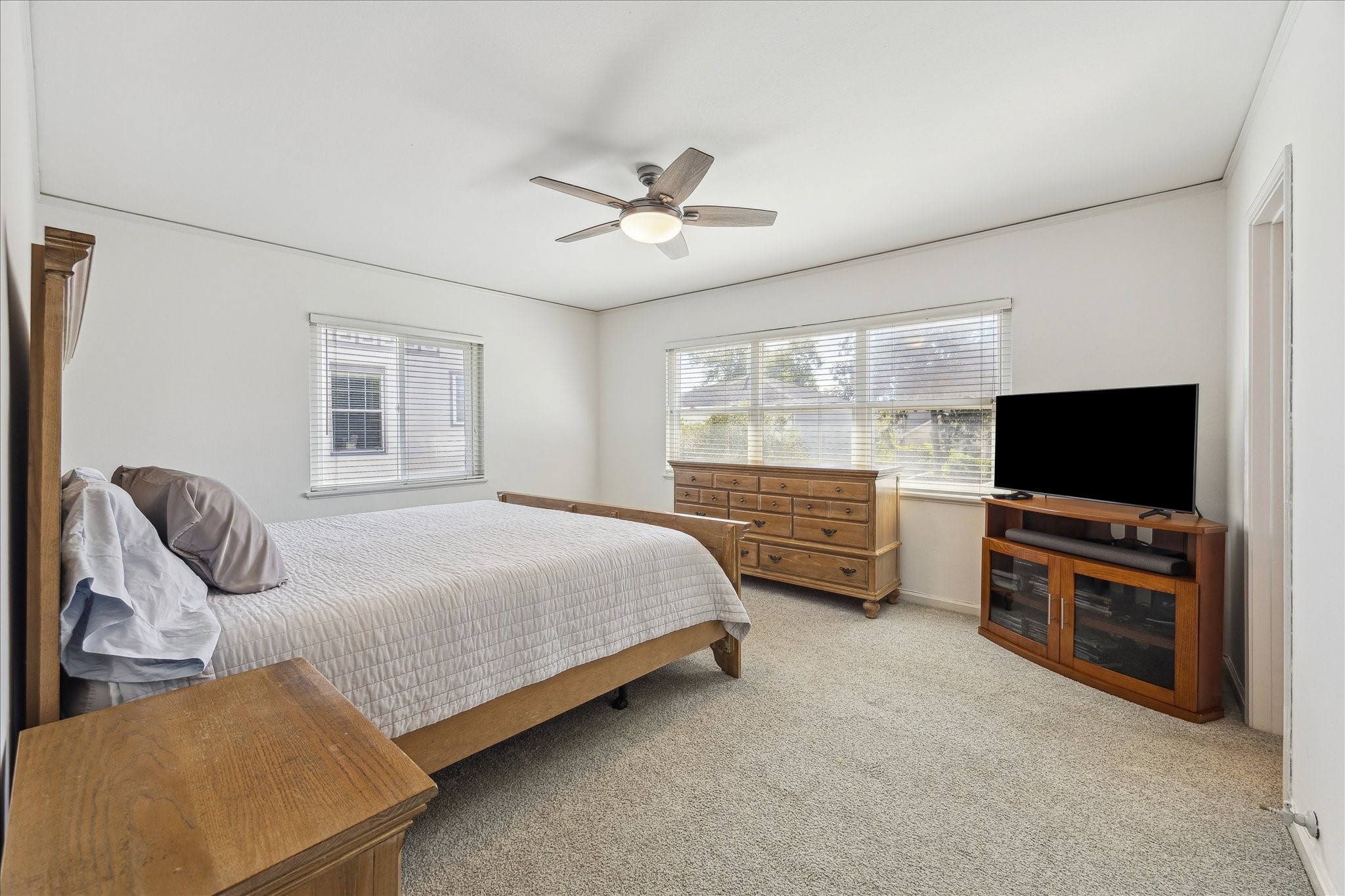 4388 Fiesta Lane Houston, TX 77004 - Photo 15 of 24 a bedroom with bed and tv