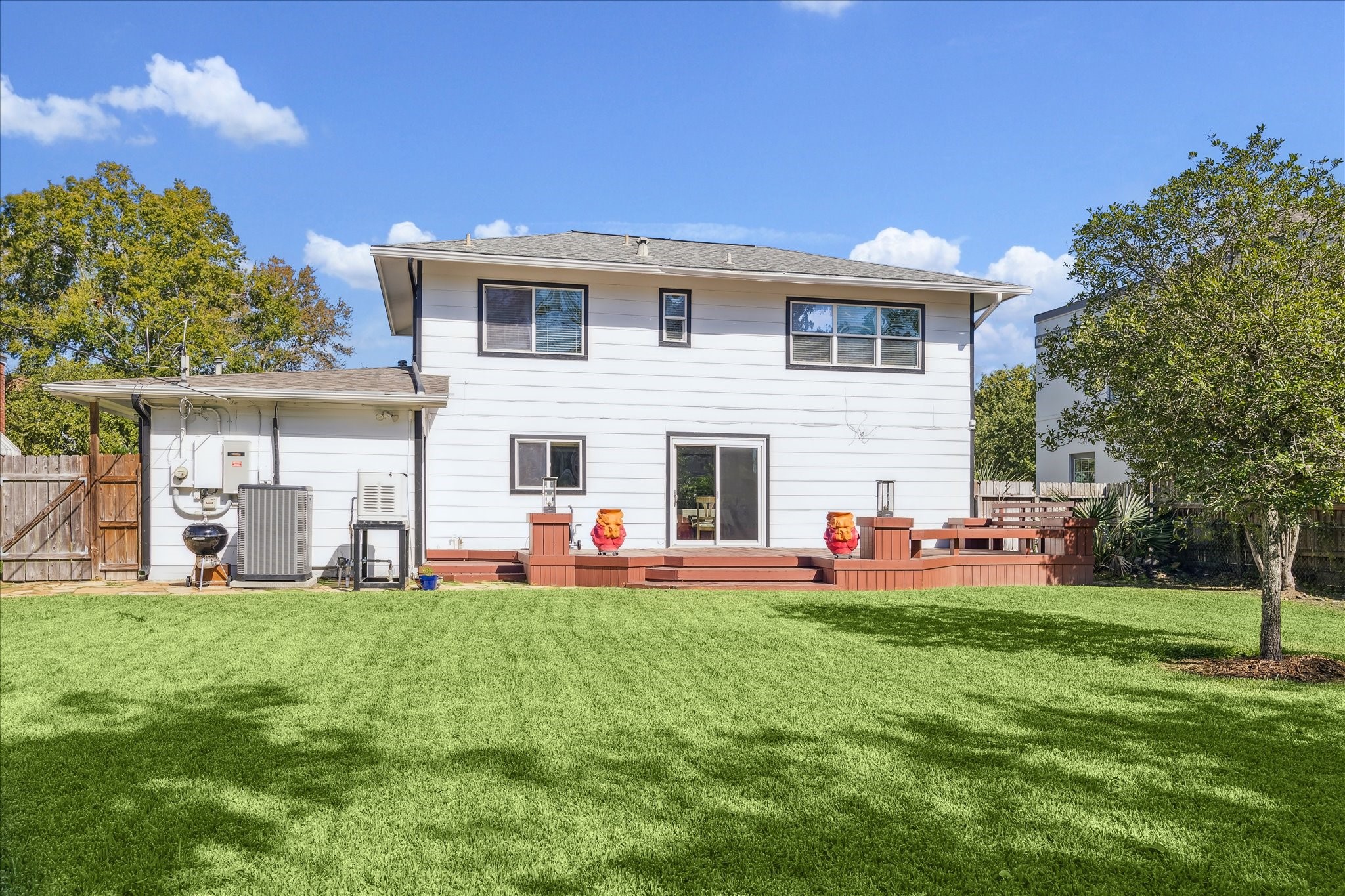 4388 Fiesta Lane Houston, TX 77004 - Photo 21 of 24 a front view of house with yard and outdoor seating