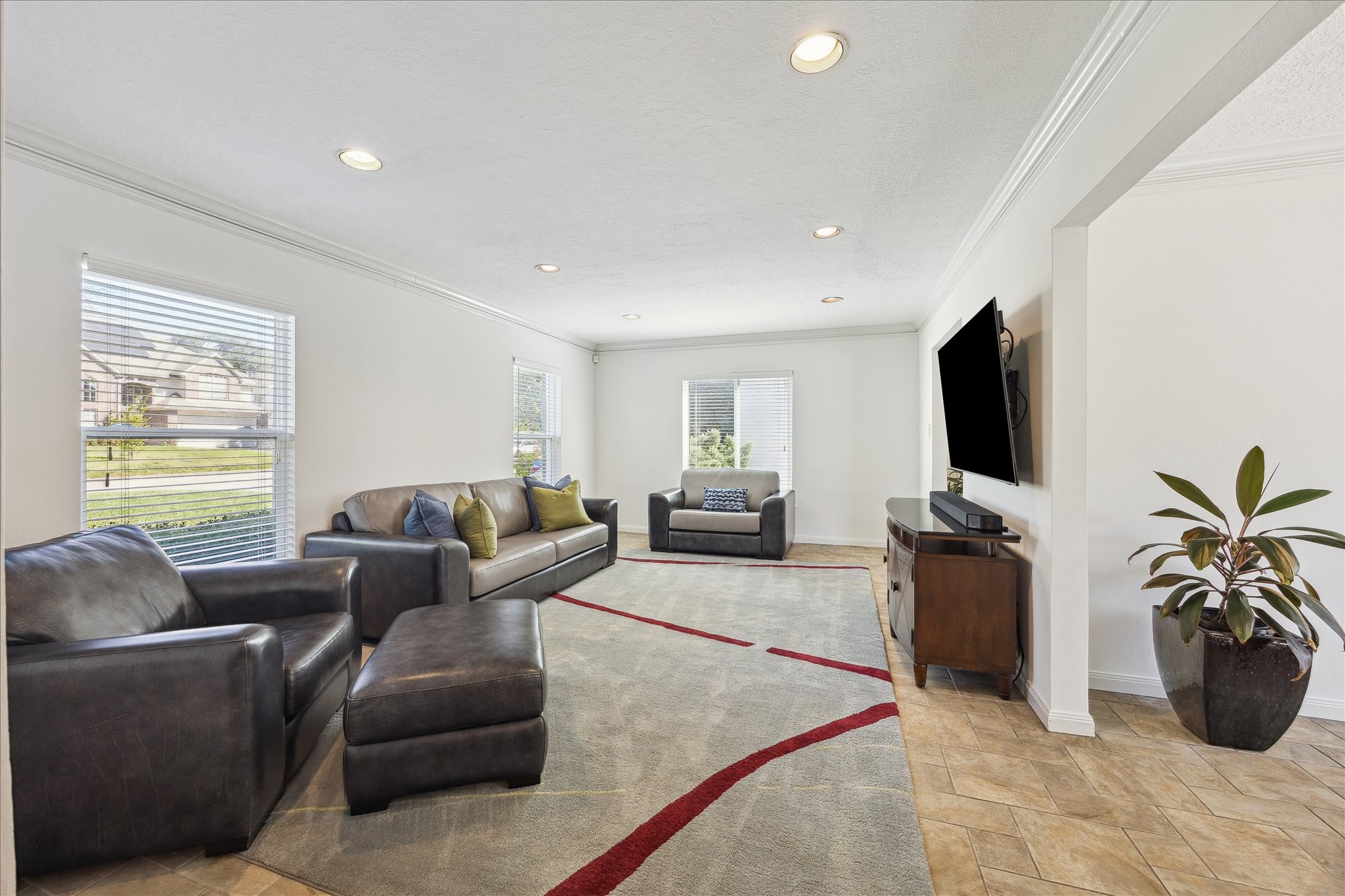 4388 Fiesta Lane Houston, TX 77004 - Photo 4 of 24 a living room with furniture and a flat screen tv