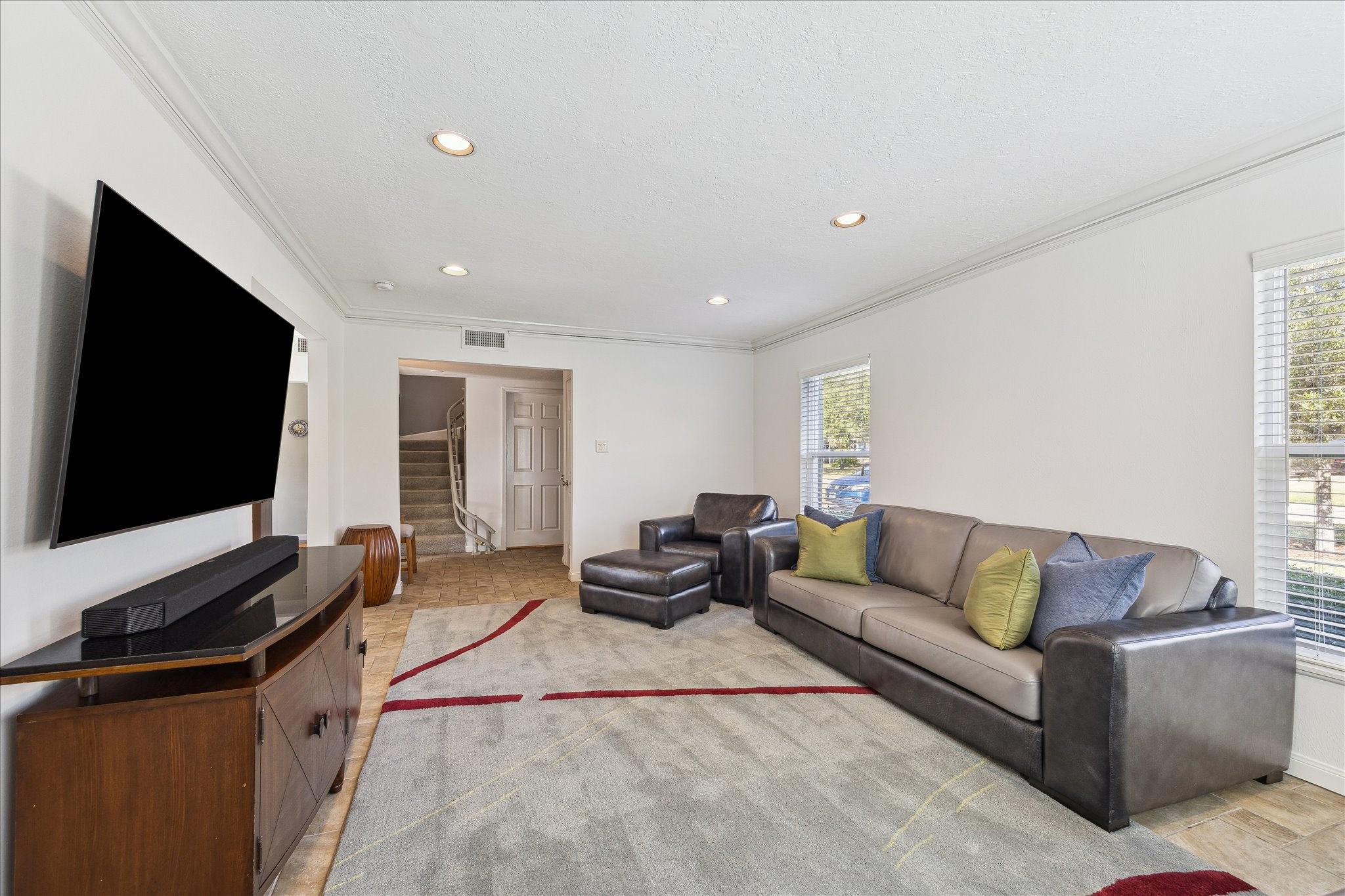 4388 Fiesta Lane Houston, TX 77004 - Photo 5 of 24 a living room with furniture and a flat screen tv