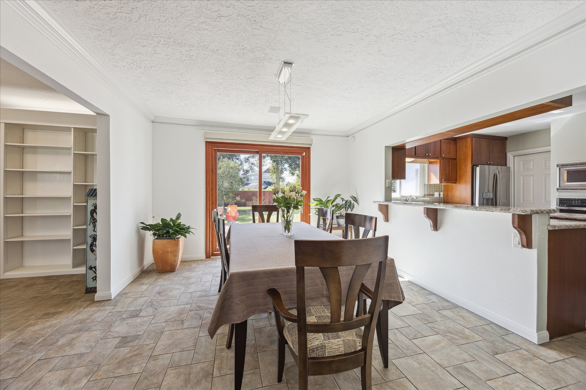 4388 Fiesta Lane Houston, TX 77004 - Photo 8 of 24 a dining room with furniture and window
