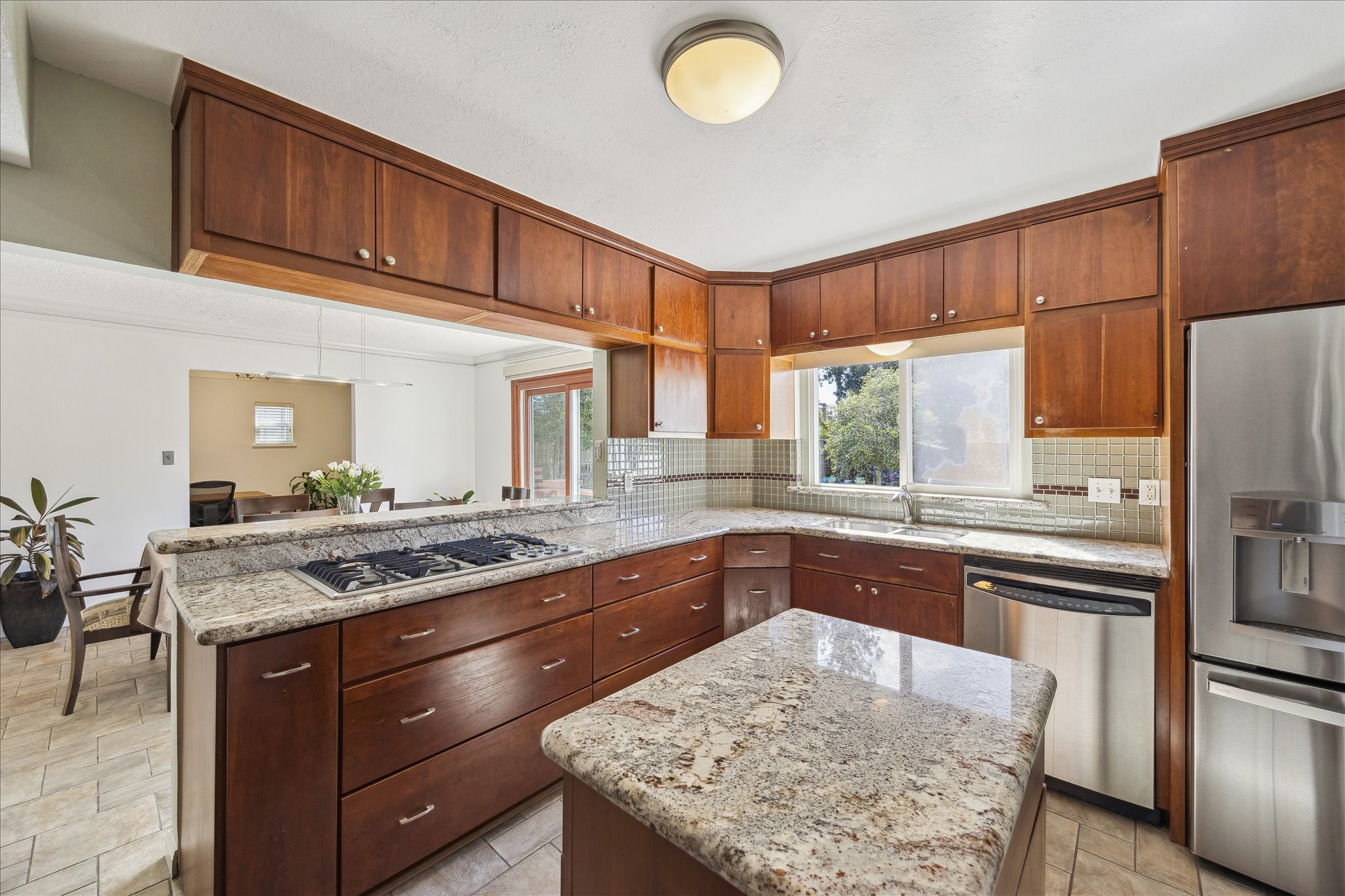 4388 Fiesta Lane Houston, TX 77004 - Photo 10 of 24 a kitchen with a stove sink and cabinets