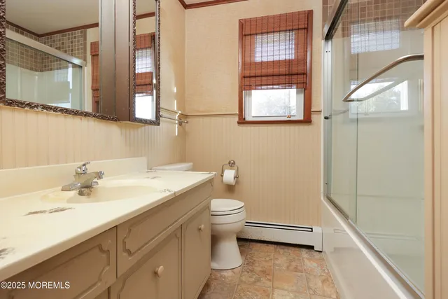 a view of a room with wooden walls