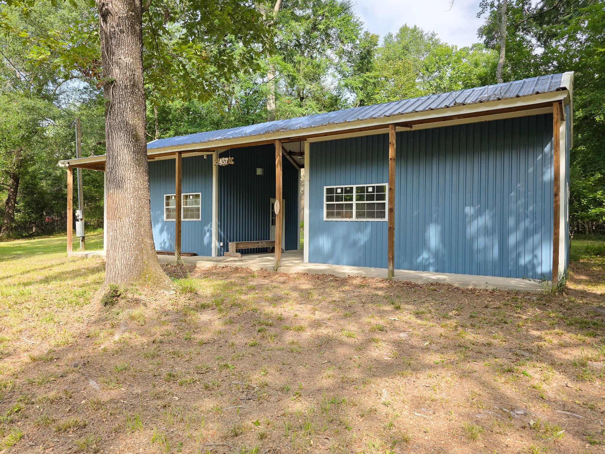 437 East Lumbermans Road Onalaska, TX 77360 - Photo 1 of 17 This charming barndo is nestled among mature trees, offering a serene, wooded setting. Ideal for nature lovers seeking privacy and tranquility.