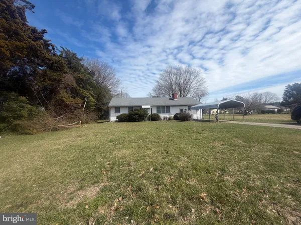 a view of house with outdoor space