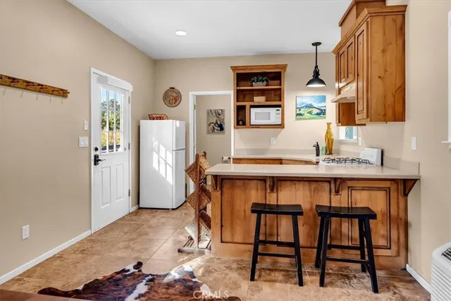 a room with a table and chairs