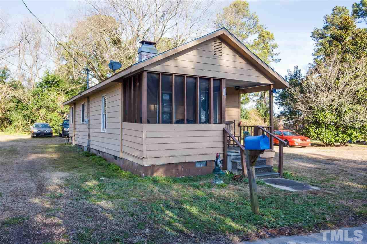 207 Jackson Street Dunn, NC 28334 - Photo 2 of 4 a view of a house with backyard