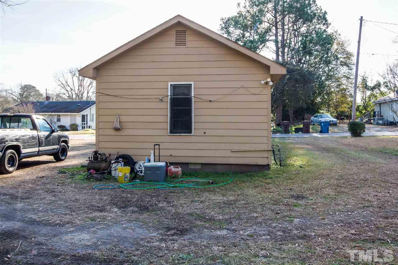 207 Jackson Street Dunn, NC 28334 - Photo 4 of 4 a view of a small house with backyard