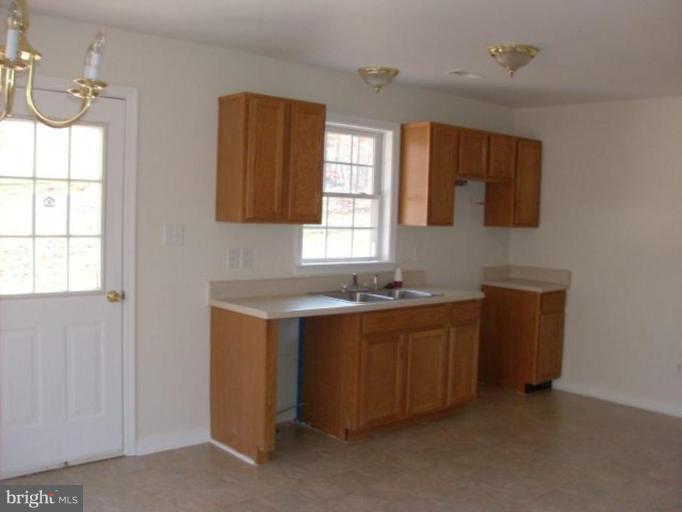265 Cedar Ridge Drive Ruther Glen, VA 22546 - Photo 3 of 10 a kitchen with sink and window