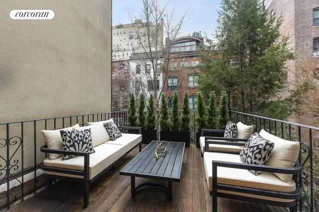 a kitchen with a stove a sink and a refrigerator