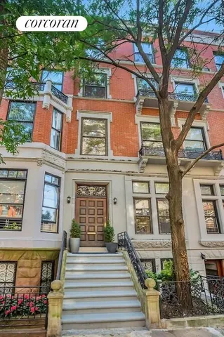 a view of a livingroom with wooden floor