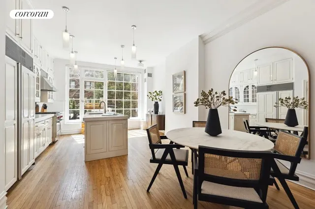 a dining room with furniture window wooden floor