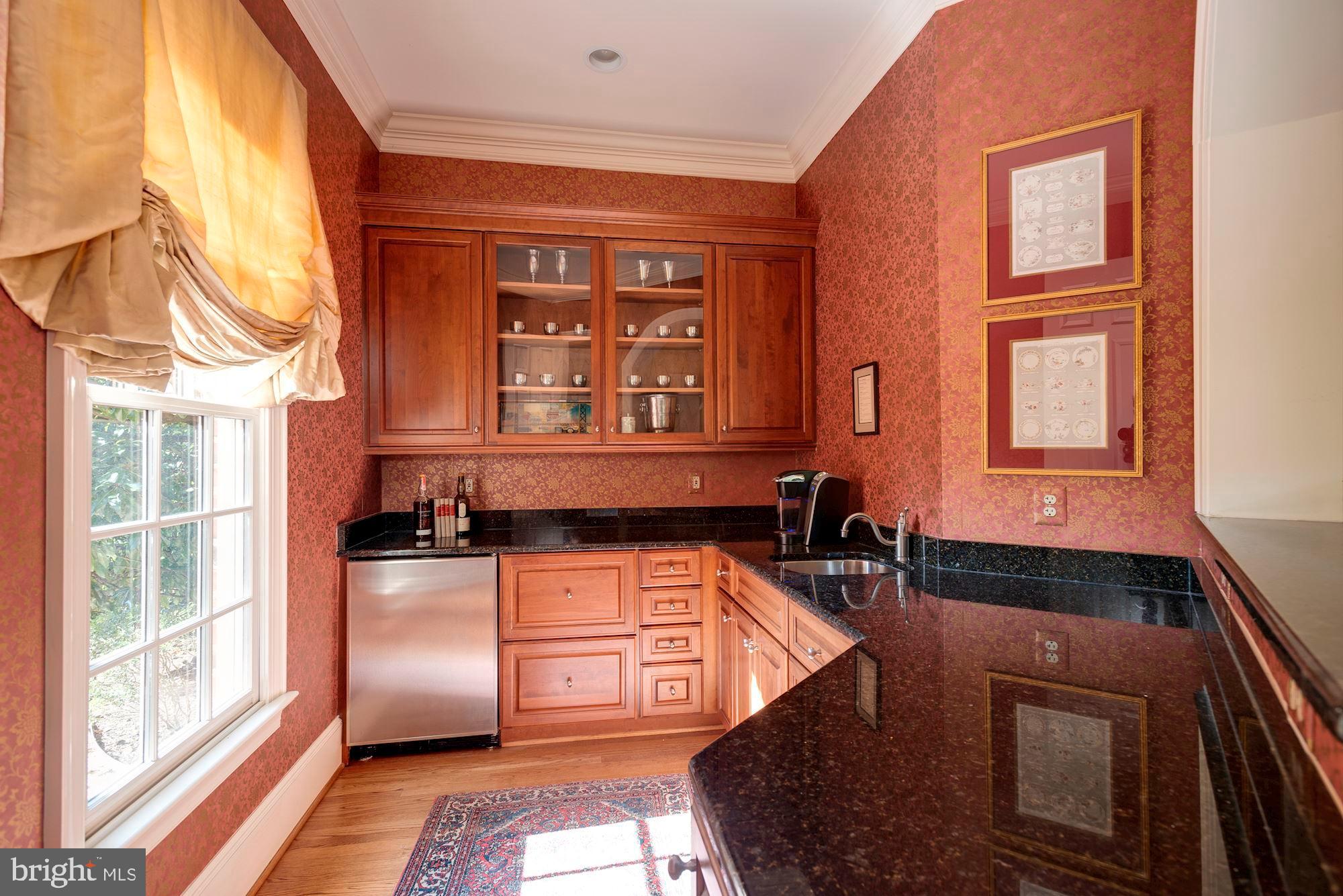 1099 Langley Fork Lane McLean, VA 22101 - Photo 17 of 33 a kitchen with stainless steel appliances granite countertop a stove and a cabinets