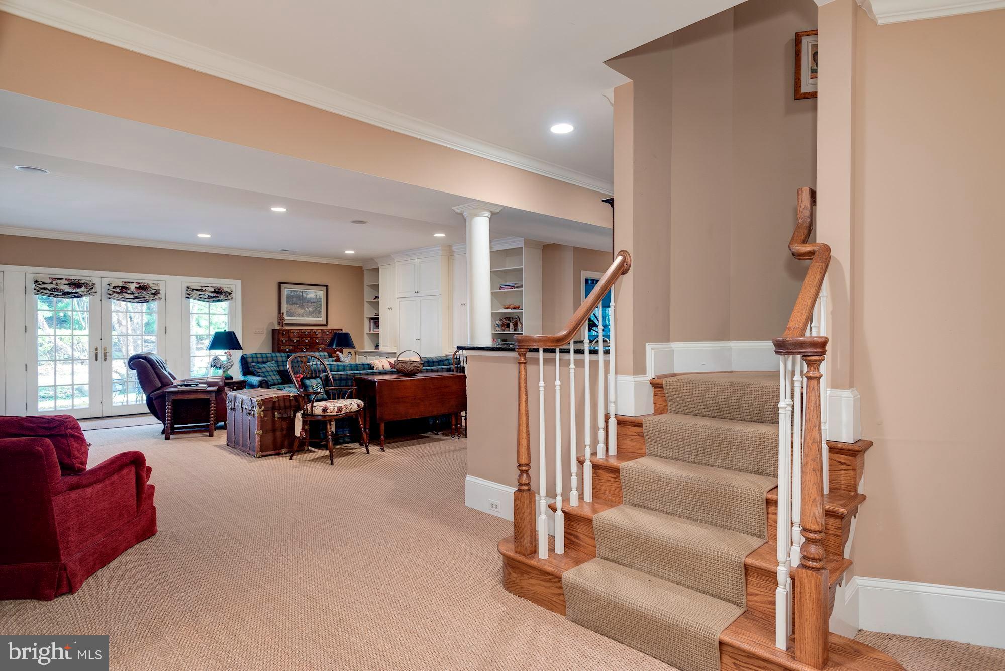 1099 Langley Fork Lane McLean, VA 22101 - Photo 25 of 33 a living room with furniture and wooden floor