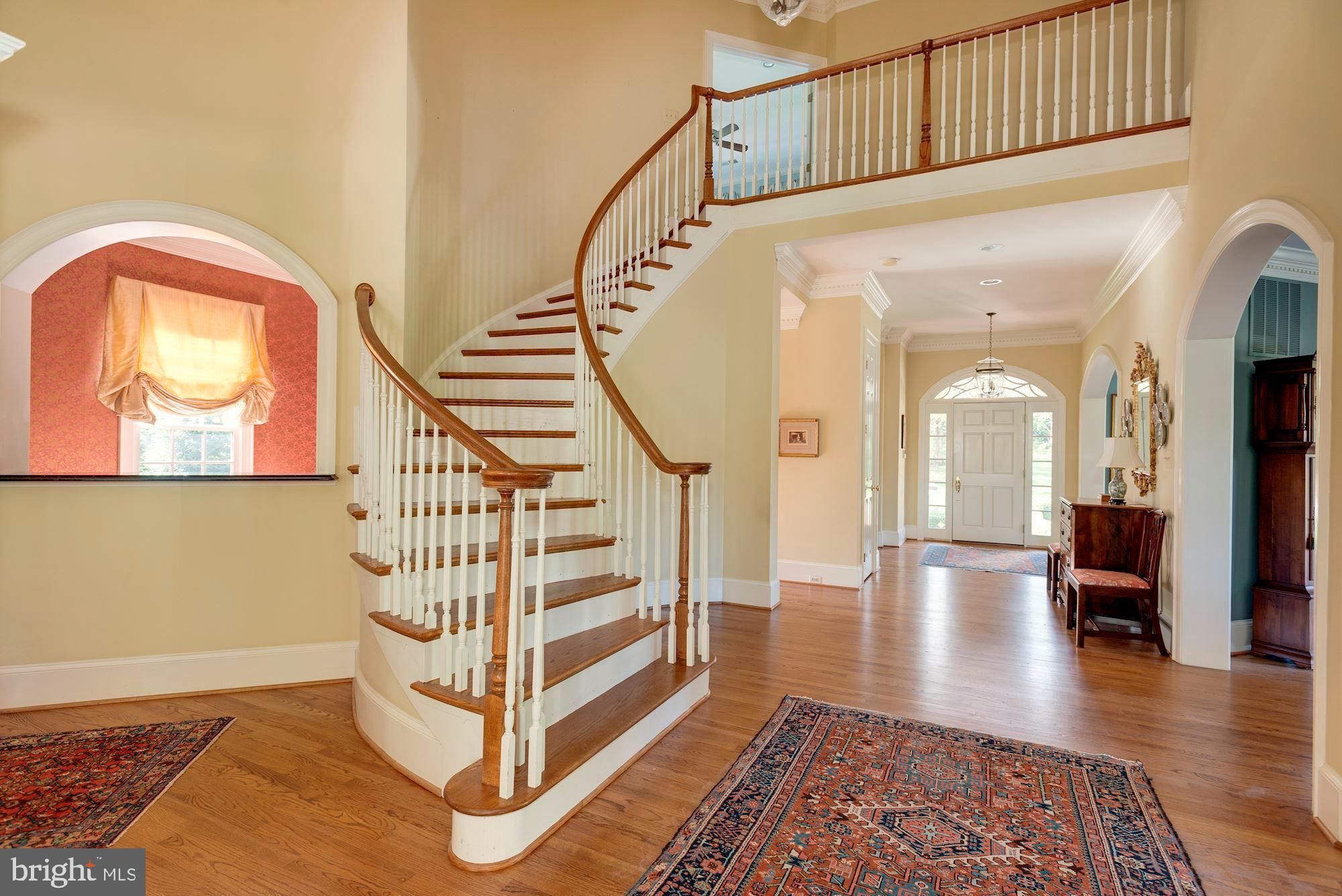 1099 Langley Fork Lane McLean, VA 22101 - Photo 6 of 33 a view of entryway and hall with wooden floor