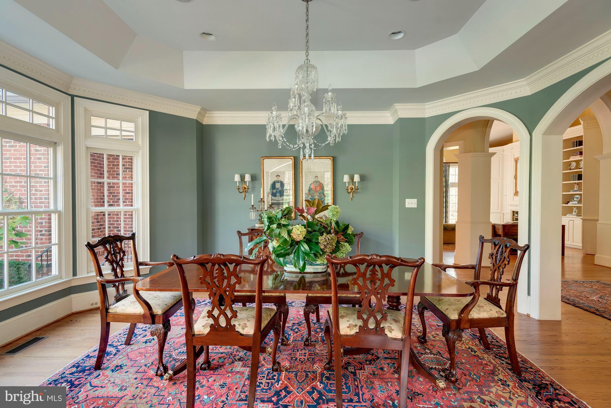 1099 Langley Fork Lane McLean, VA 22101 - Photo 9 of 33 a view of a dining room with furniture and chandelier