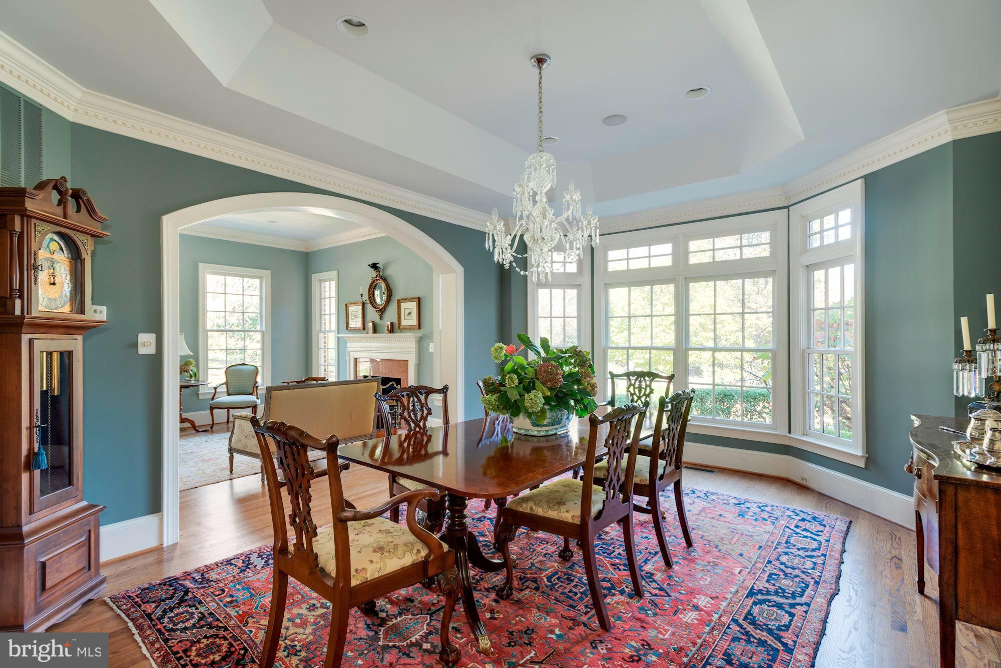 1099 Langley Fork Lane McLean, VA 22101 - Photo 10 of 33 a view of a dining room with furniture window and wooden floor