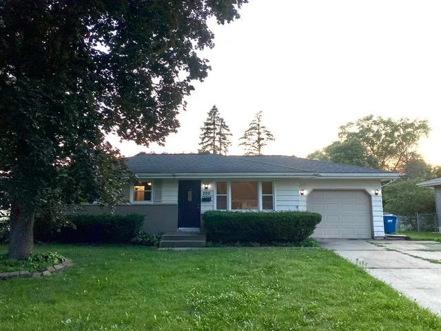 a house view with a garden space