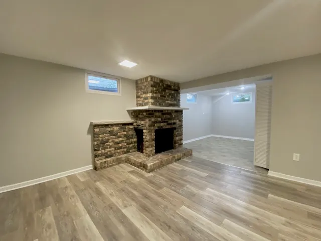 a view of a livingroom with a fireplace