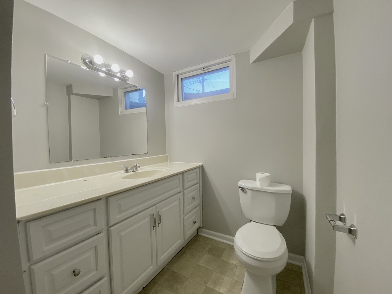 200 Patrick Drive South Elgin, IL 60177 - Photo 17 of 23 a bathroom with a toilet sink and mirror