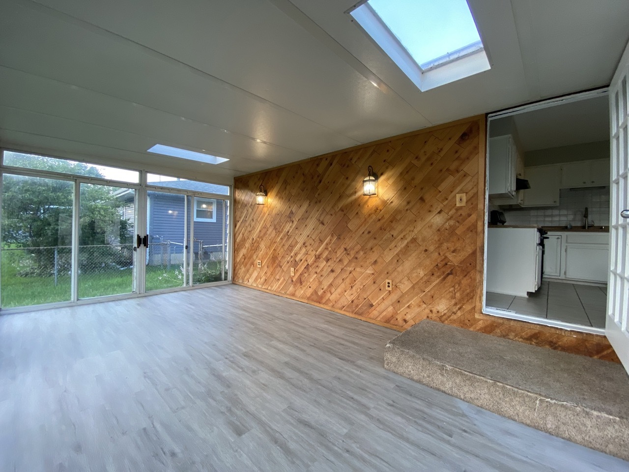 200 Patrick Drive South Elgin, IL 60177 - Photo 7 of 23 a view of empty room with wooden floor and fan