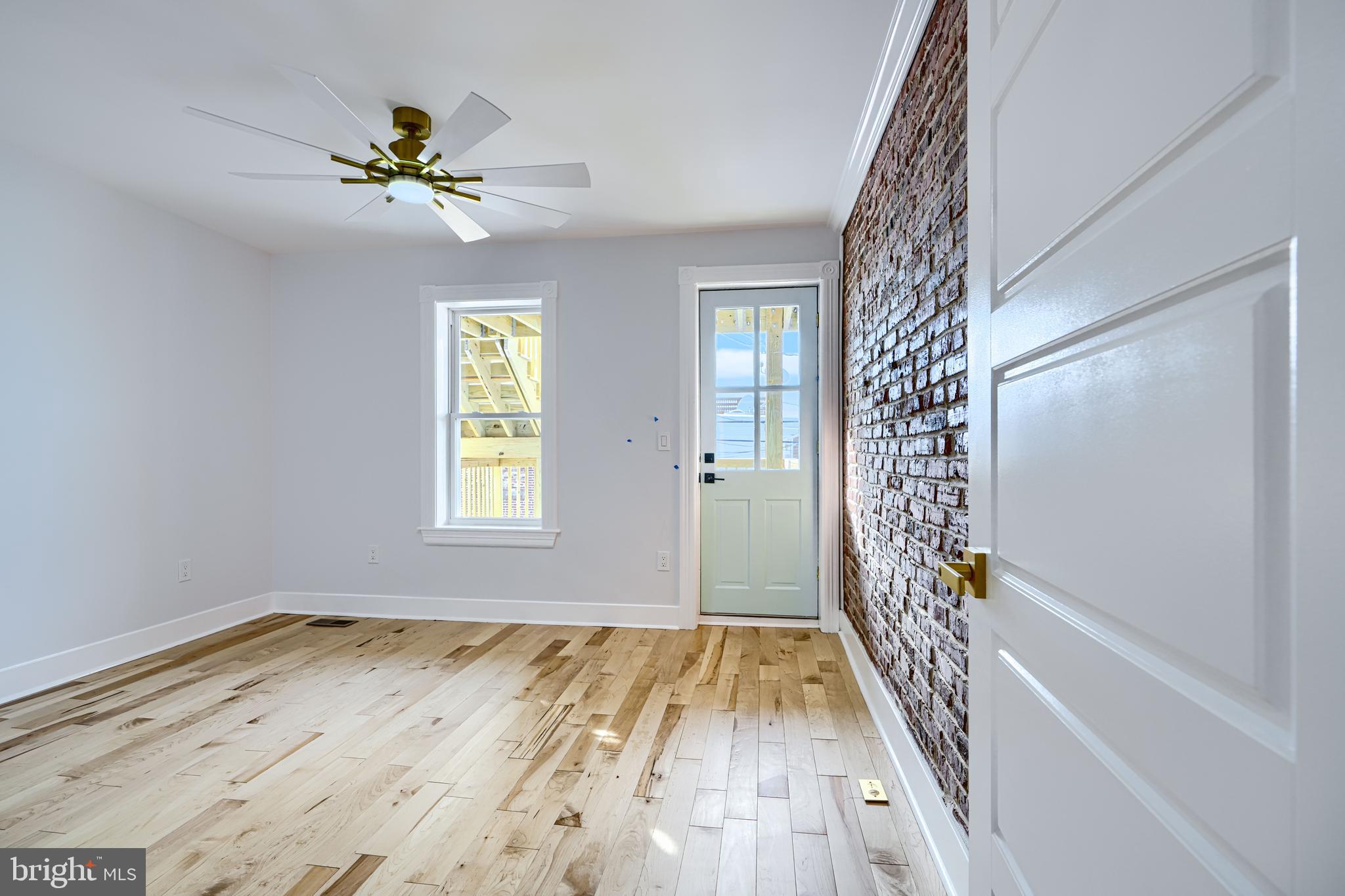3825 Foster Avenue Baltimore, MD 21224 - Photo 27 of 54 a view of an entryway with wooden floor