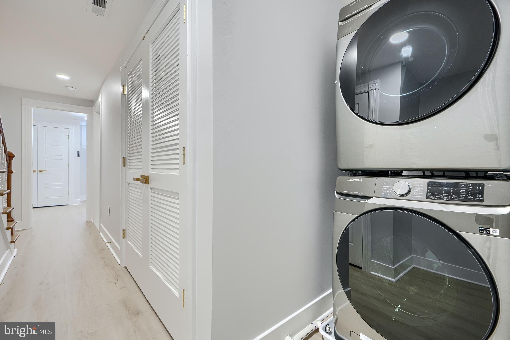 3825 Foster Avenue Baltimore, MD 21224 - Photo 48 of 54 a view of a hallway with washer and dryer