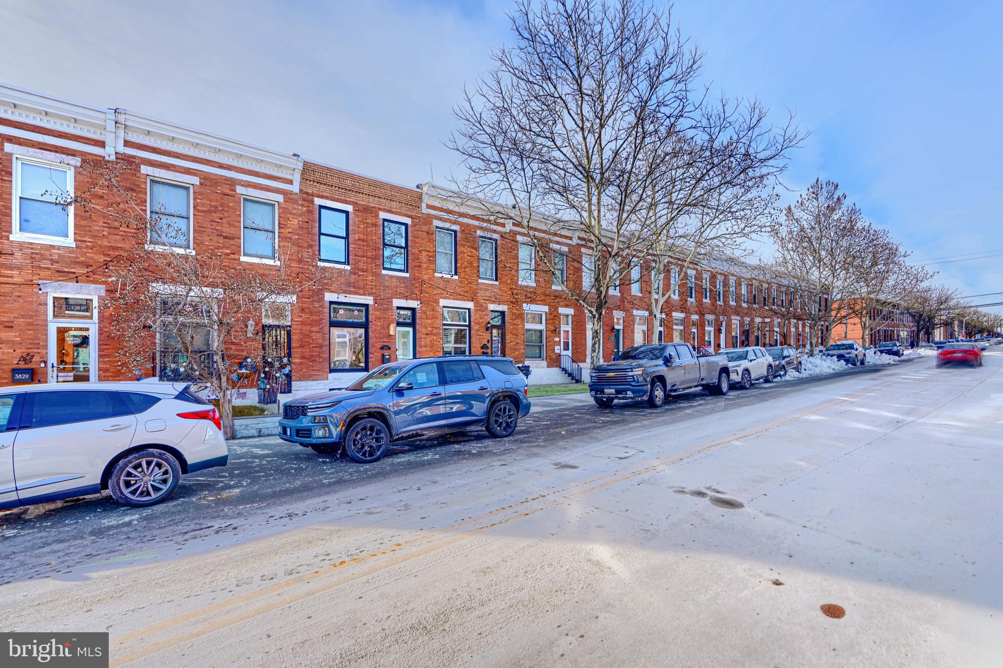 3825 Foster Avenue Baltimore, MD 21224 - Photo 54 of 54 a car parked in front of a building